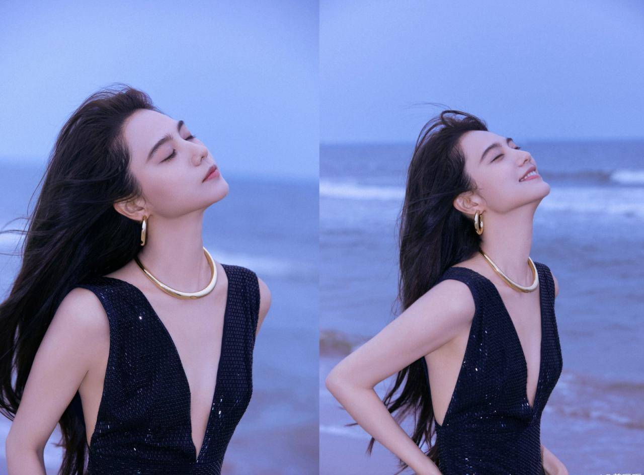 姜珮瑶一袭黑色深V长裙海边浪漫写真图片